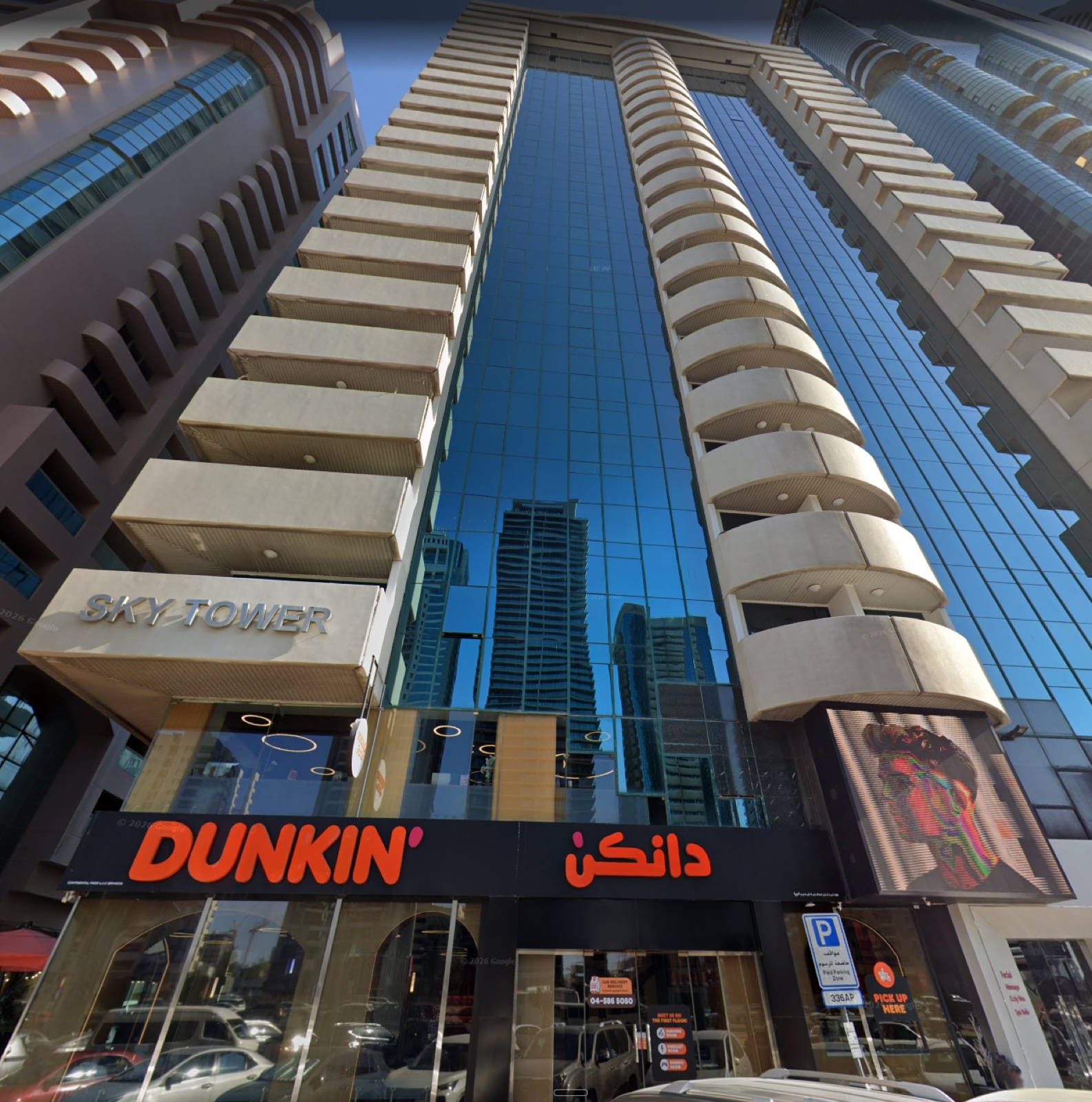 Sky Tower, DIFC — PodcastHub × Dunkin partnership studio